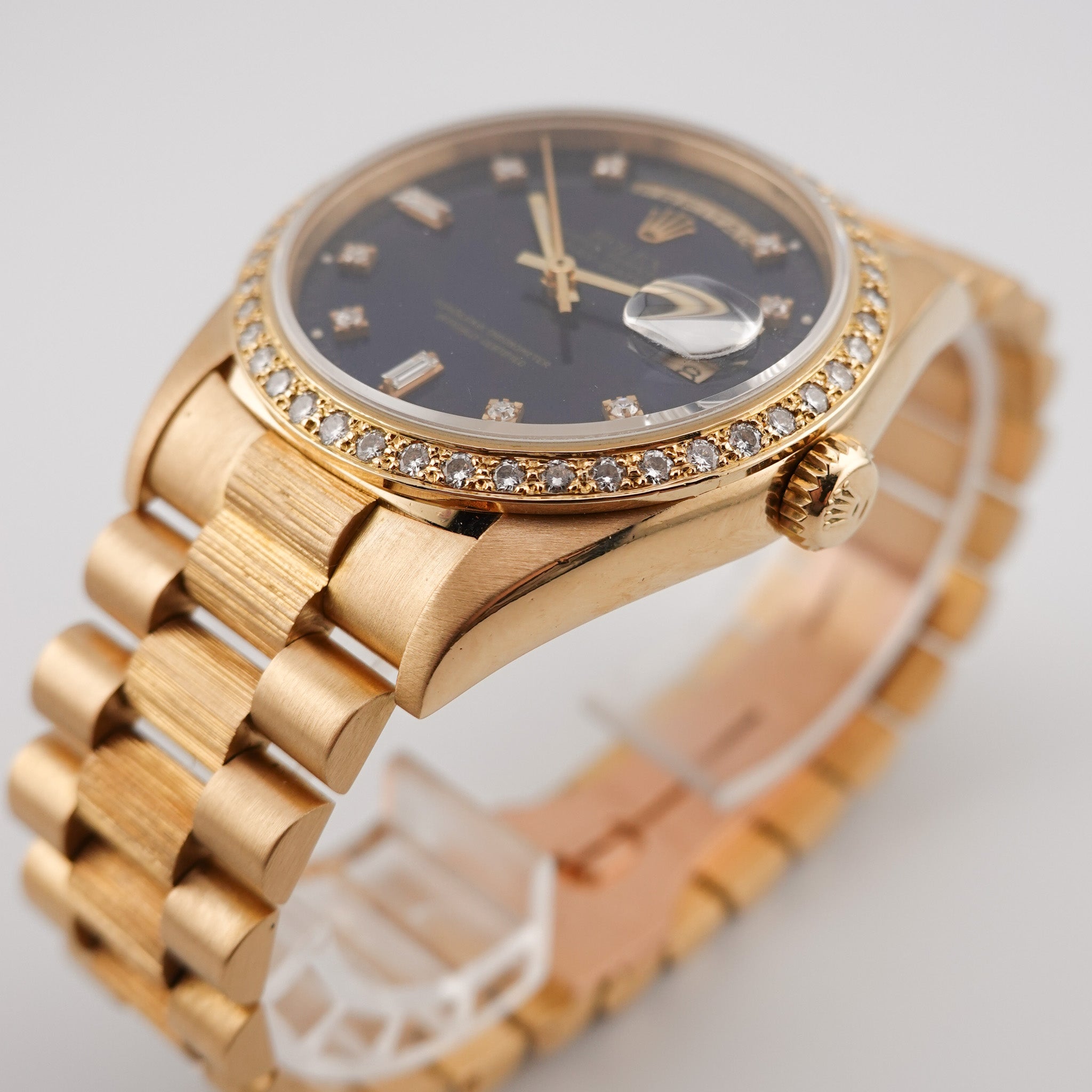 Rolex Day-Date 36 "Factory Diamond Bezel" Gelbgold 18248