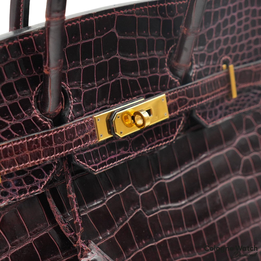 Hermès Birkin 35 aus Krokodil Leder mit Gelbgold Beschlägen in Bordeaux