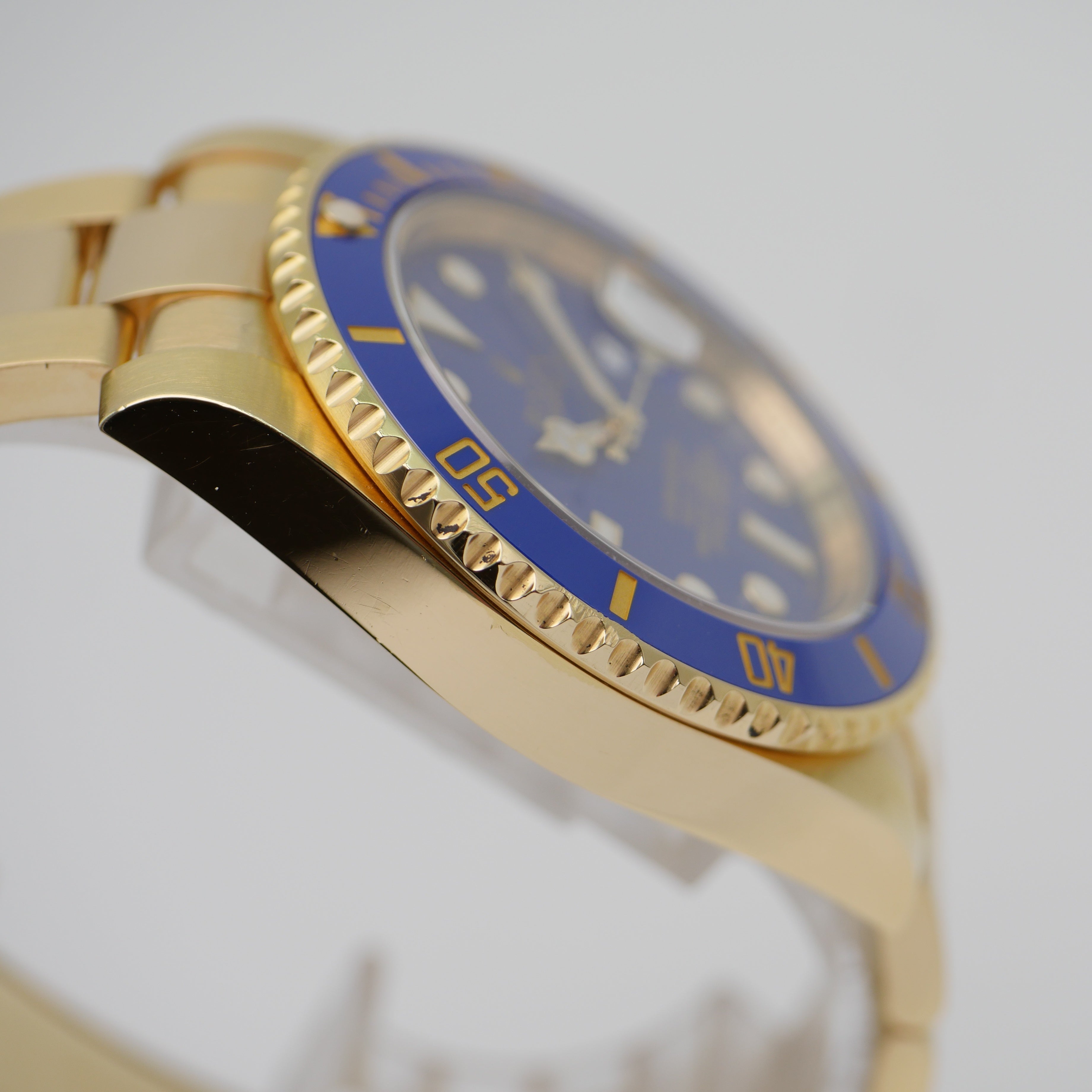 Rolex Submariner 40 Gelbgold 116618LB - 2012